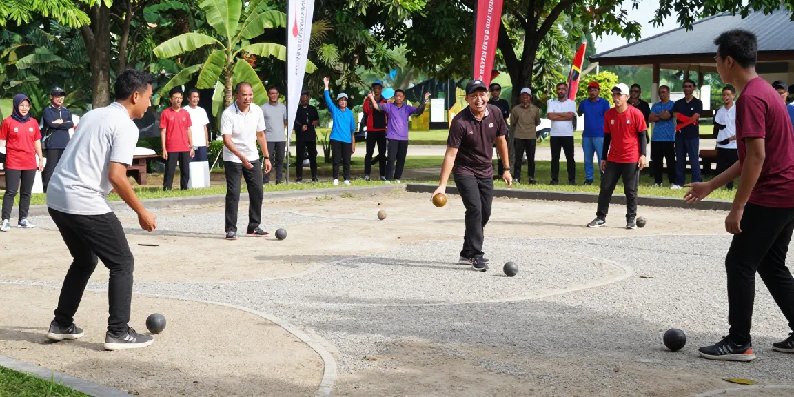 Petanque players in action at fopikotabalikpap.org outdoor event, showcasing community spirit and engagement.